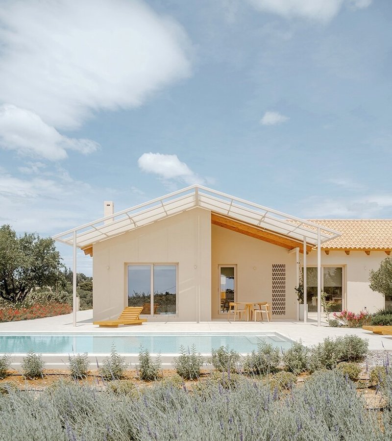 pitched timber roofs unify greek renovation project by local firm oblq